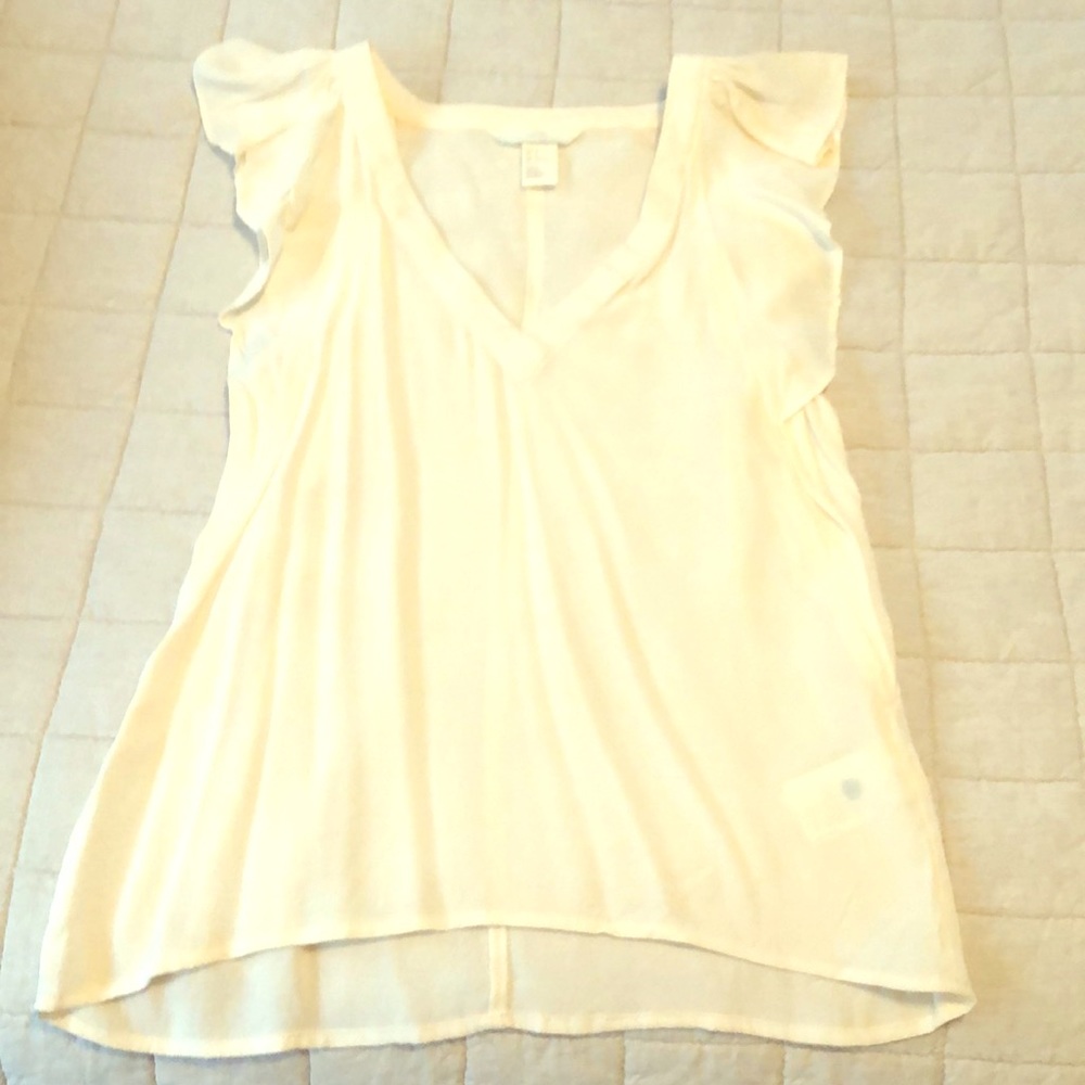 Ivory shell top with flutter sleeves
